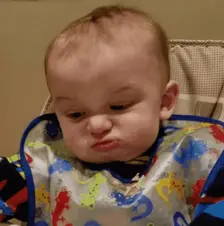 A baby giving a very unimpressed side-eye